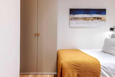 Cama o camas de una habitación en Apartamento Puerta de America VII en Madrid