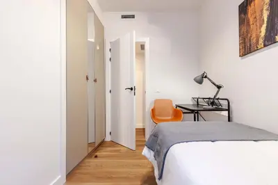 Cama o camas de una habitación en Apartamento Puerta de America VII en Madrid