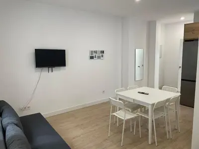 Una televisión o centro de entretenimiento en U4 Apartamento centro Madrid
