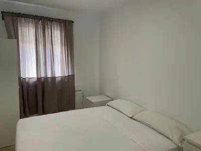 Cama o camas de una habitación en U5 Bien situado cerca de metro