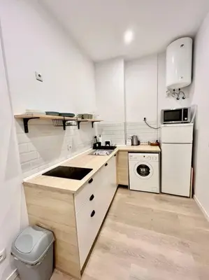 Una cocina o zona de cocina en Espectacular apartamento Madrid