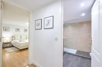 Cama o camas de una habitación en Lovely Apartments - Alójate en el corazón de Madrid