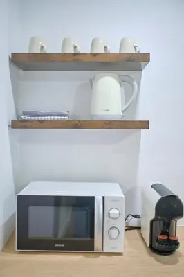 Una cocina o zona de cocina en Lovely Apartments - Alójate en el corazón de Madrid