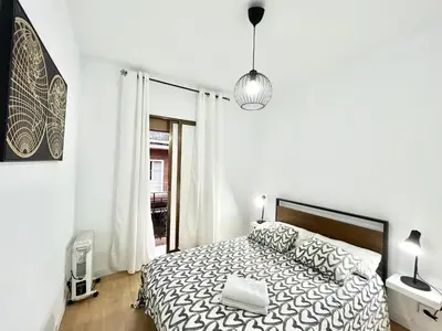 Cama o camas de una habitación en Plaza Rio A