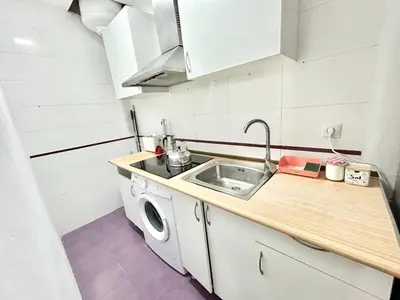 Una cocina o zona de cocina en Plaza Rio A