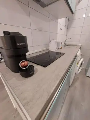 Una cocina o zona de cocina en Cozy studio for 2 people in Gran Via.SI2A2