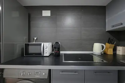 Una cocina o zona de cocina en Lovely Apartments - Increíble loft en el corazón de Madrid