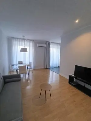 Una televisión o centro de entretenimiento en Apartamento en Huertas