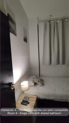 Cama o camas de una habitación en Chueca Rooms Madrid