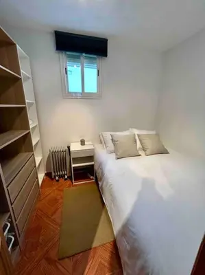 Cama o camas de una habitación en MyHouseSpain - Fantastico piso en Calle Fuencarral