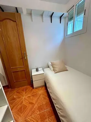 Cama o camas de una habitación en MyHouseSpain - Fantastico piso en Calle Fuencarral