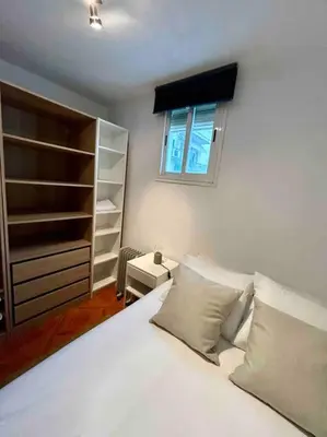 Cama o camas de una habitación en MyHouseSpain - Fantastico piso en Calle Fuencarral