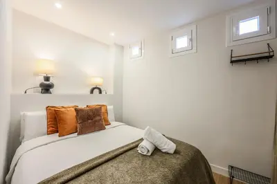 Cama o camas de una habitación en Apartamento doble centro Madrid