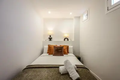Cama o camas de una habitación en Apartamento doble centro Madrid