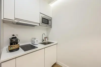 Una cocina o zona de cocina en Apartamento doble centro Madrid