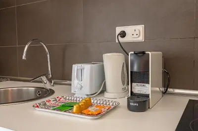 Una cocina o zona de cocina en Céntrico Plaza España - Gran Vía V