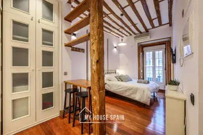 Cama o camas de una habitación en MyHouseSpain - Moderno Estudio en Plaza España