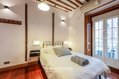 Cama o camas de una habitación en MyHouseSpain - Moderno Estudio en Plaza España