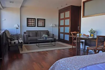 Zona de estar de Suite-Estudio en el Centro Colon