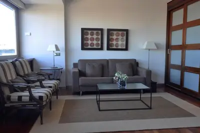 Zona de estar de Suite-Estudio en el Centro Colon