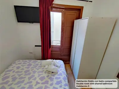 Cama o camas de una habitación en Madrid Centro Rooms