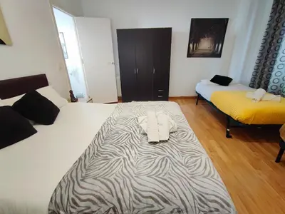 Cama o camas de una habitación en Madrid Centro Rooms