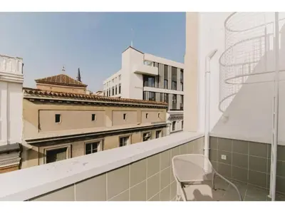Un balcón o terraza de SkyLine penthouse in the heart of Madrid TET