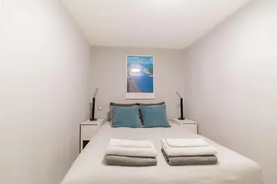 Cama o camas de una habitación en Cozy apartment in the heart of Madrid.M31