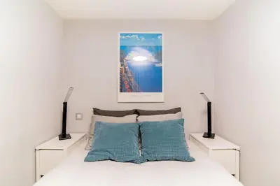 Cama o camas de una habitación en Cozy apartment in the heart of Madrid.M31