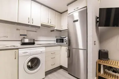 Una cocina o zona de cocina en Cozy apartment in the heart of Madrid.M31