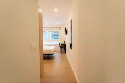 Cama o camas de una habitación en I'M Room Suites Nuevos Ministerios - Bernabeu 'Digital Access'