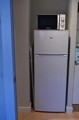 Una cocina o zona de cocina en Homelikes Madrid