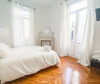 Cama o camas de una habitación en MEZZANINE ORANGE