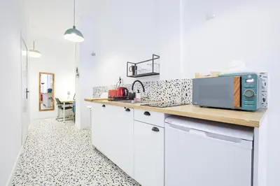 Una cocina o zona de cocina en MEZZANINE ORANGE