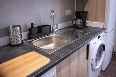 Una cocina o zona de cocina en APARTAMENTO ANTONIO LOPEZ - A