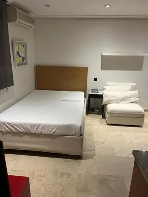 Cama o camas de una habitación en Exyca Malasaña