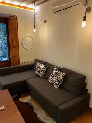 Zona de estar de Exyca Malasaña