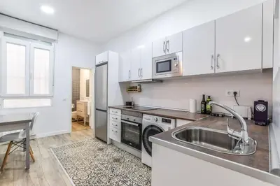 Una cocina o zona de cocina en Latina Corporate Housing with Billard &Darts