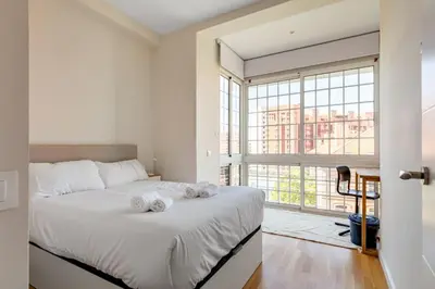 Cama o camas de una habitación en Bright Modern-2Bedroom 1Bathroom -Av. de América