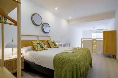 Cama o camas de una habitación en Stylish Duplex-1Bedroom-1.5Baths-Delicias Atocha
