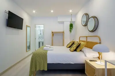 Cama o camas de una habitación en Stylish Duplex-1Bedroom-1.5Baths-Delicias Atocha