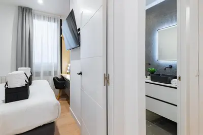 Cama o camas de una habitación en HONEY APARTMENT IN THE CENTER OF MADRID