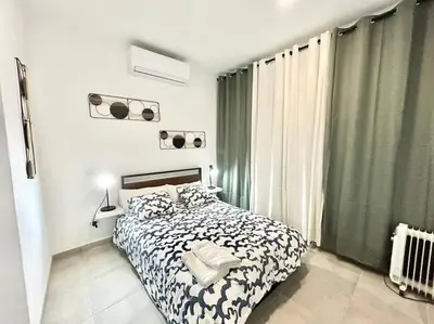 Cama o camas de una habitación en Metro Avenida de América 01
