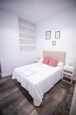 Cama o camas de una habitación en ANTONIO LÓPEZ - B
