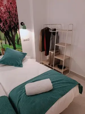 Cama o camas de una habitación en Violeta Suite