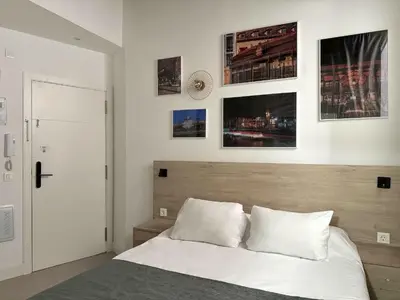 Cama o camas de una habitación en CavaBajaSuites
