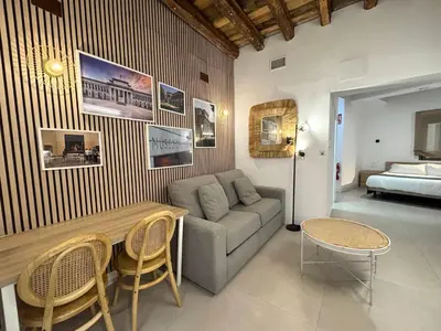 Cama o camas de una habitación en CavaBajaSuites