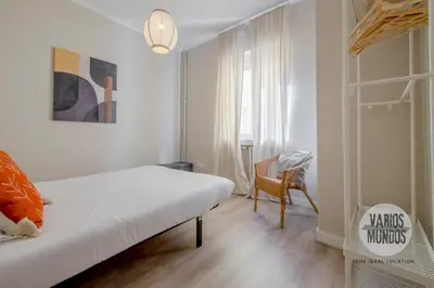 Cama o camas de una habitación en Acogedora y urbana para 6, conoce Toledo 77