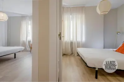 Cama o camas de una habitación en Acogedora y urbana para 6, conoce Toledo 77