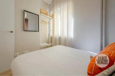 Cama o camas de una habitación en Acogedora y urbana para 6, conoce Toledo 77